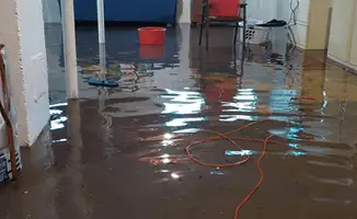 Basement with boiler, cabinets and washing machine completely flooded in Chula Vista, CA